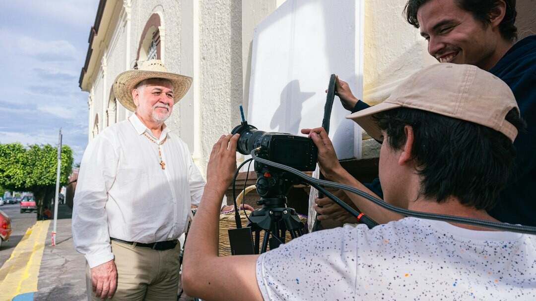 photographer interviewing elderly person