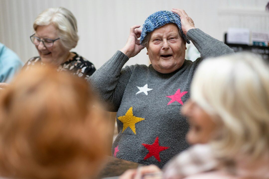group of pensioners knitting